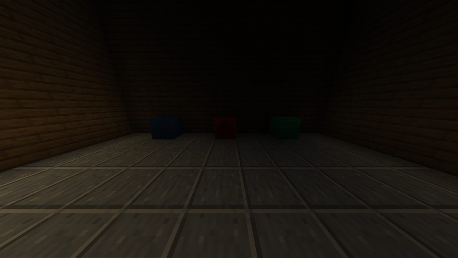 Lapis, redstone and emerald blocks in the dark, vanilla